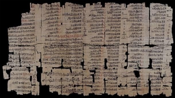 Fragment of an ancient Egyptian papyrus covered in hieratic script.