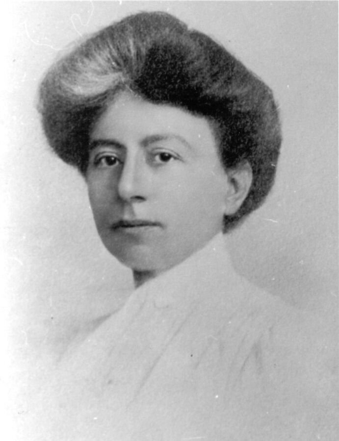 Portrait of Margaret Floy Washburn, a woman with her hair pinned up wearing a white blouse.