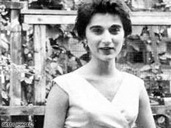 A black-and-white portrait of Kitty Genovese, a young woman.